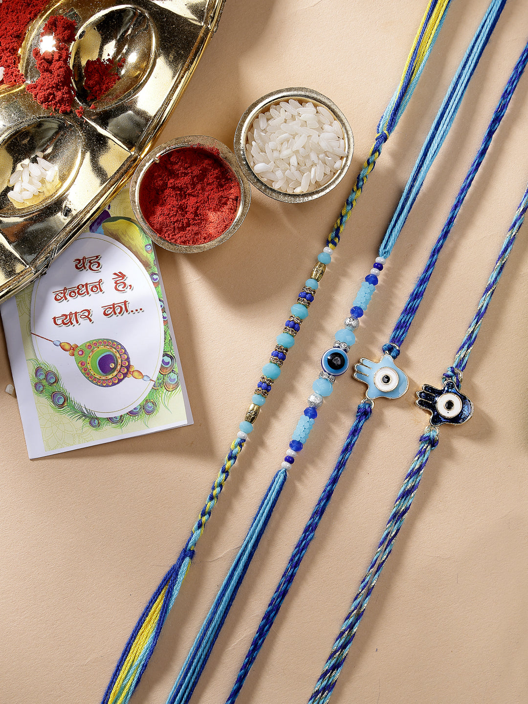 Set Of 4 Blue Evil Eye Charm Rakhi With Roli Chawal