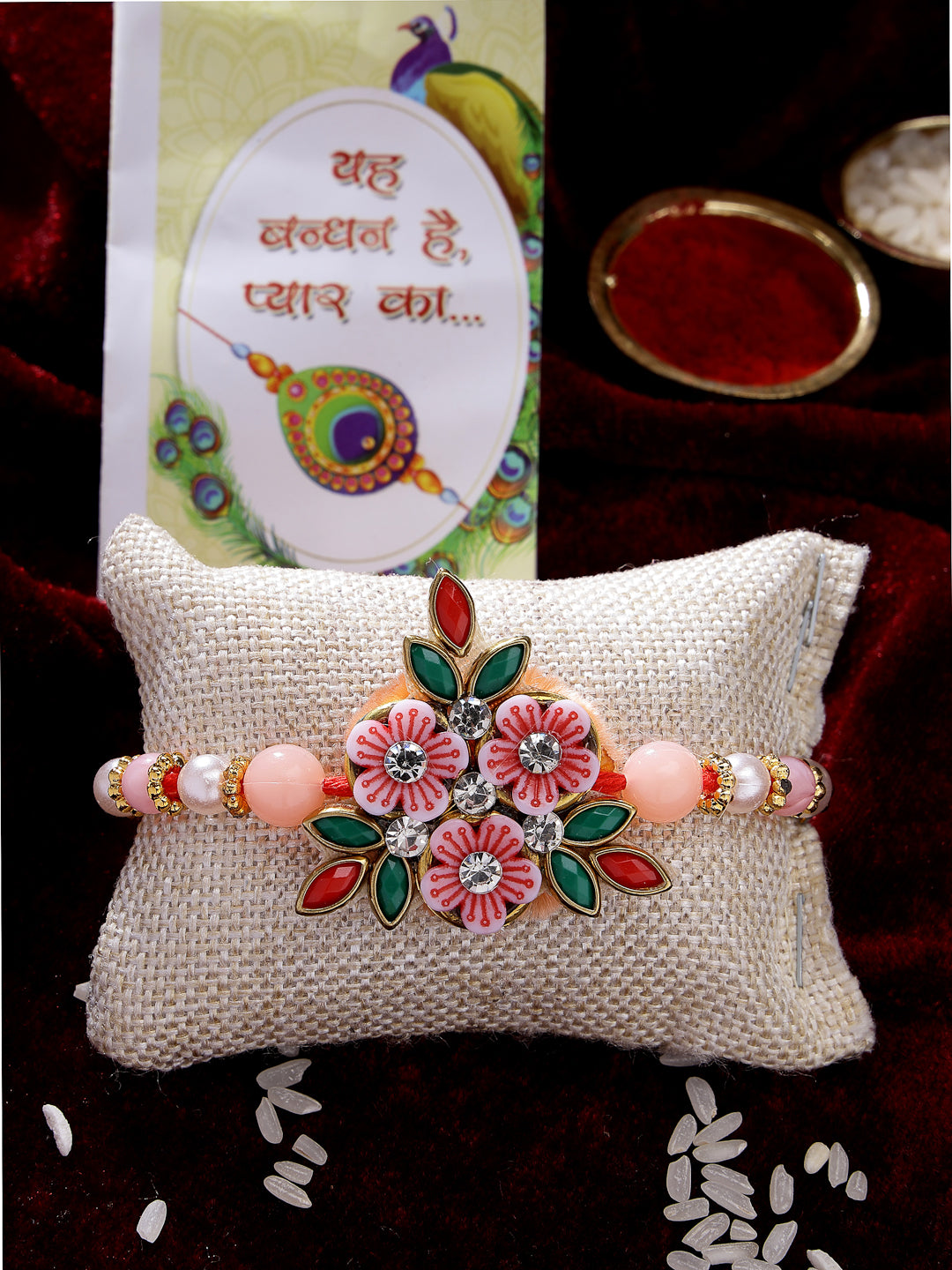 Pink Floral Shape Stone-Studdded & Beaded Rakhi With Roli Chawal & Chocolate