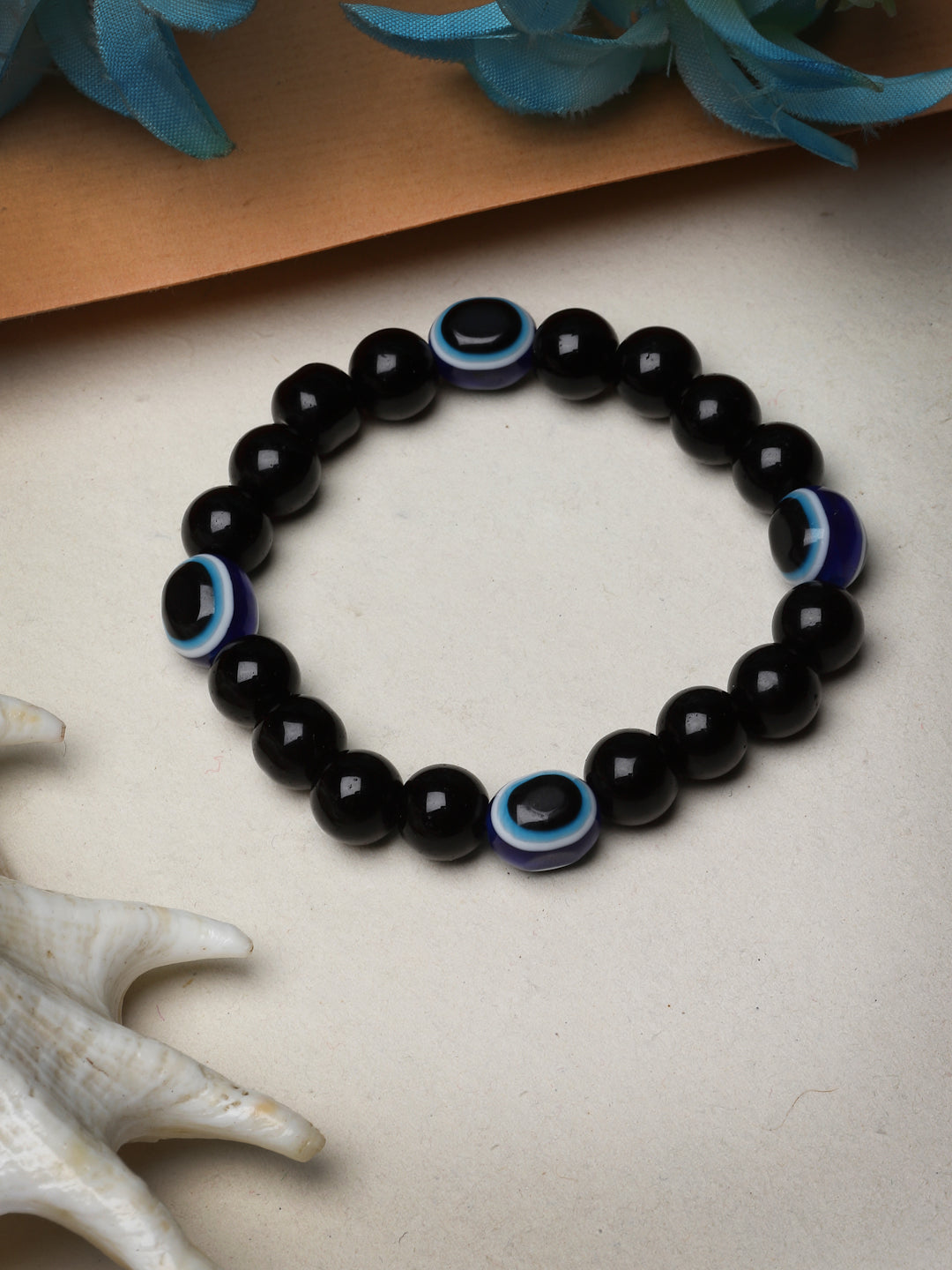Black Evil Eye Elasticated Rakhi With Roli Chawal