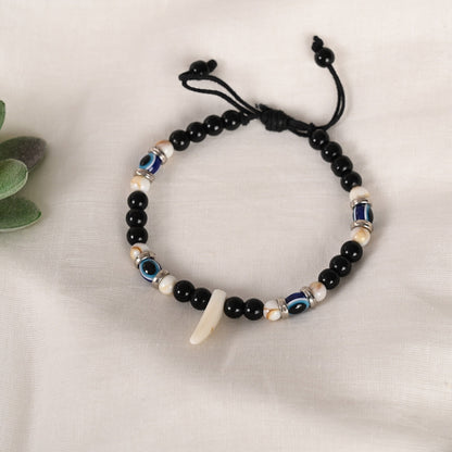 Black Evil Eye Rakhi With Roli Chawal