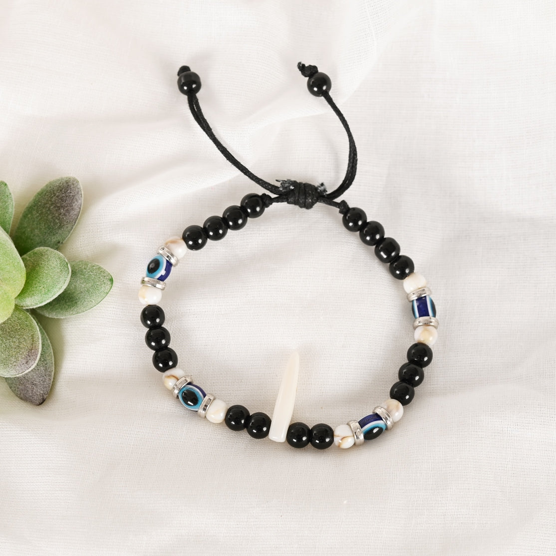Black Evil Eye Rakhi With Roli Chawal