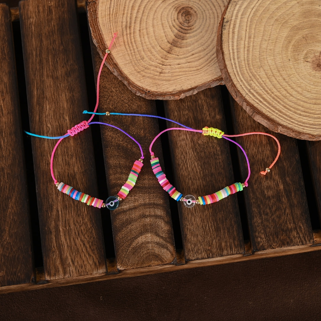 Set Of 2 Multicolor Evil Eye Rakhi With Roli Chawal
