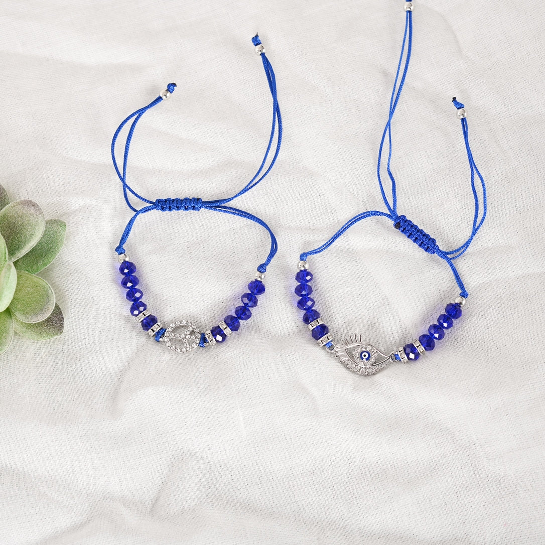 Set Of 2 Blue Evil Eye Rakhi With Roli Chawal