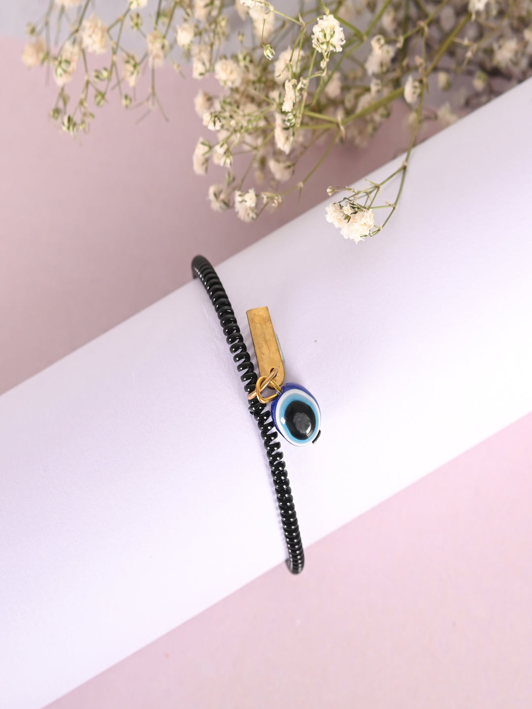 Black Evil Eye Spring Ring Rakhi With Roli Chawal