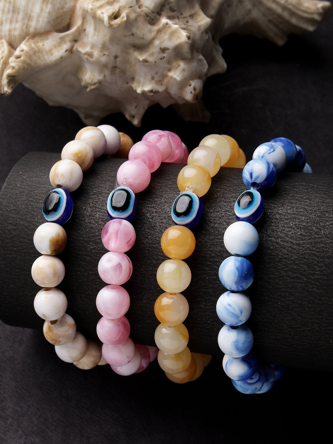 Set Of 4 Multicolor Evil Eye Elasticated Rakhi With Roli Chawal