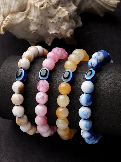 Set Of 4 Multicolor Evil Eye Elasticated Rakhi With Roli Chawal