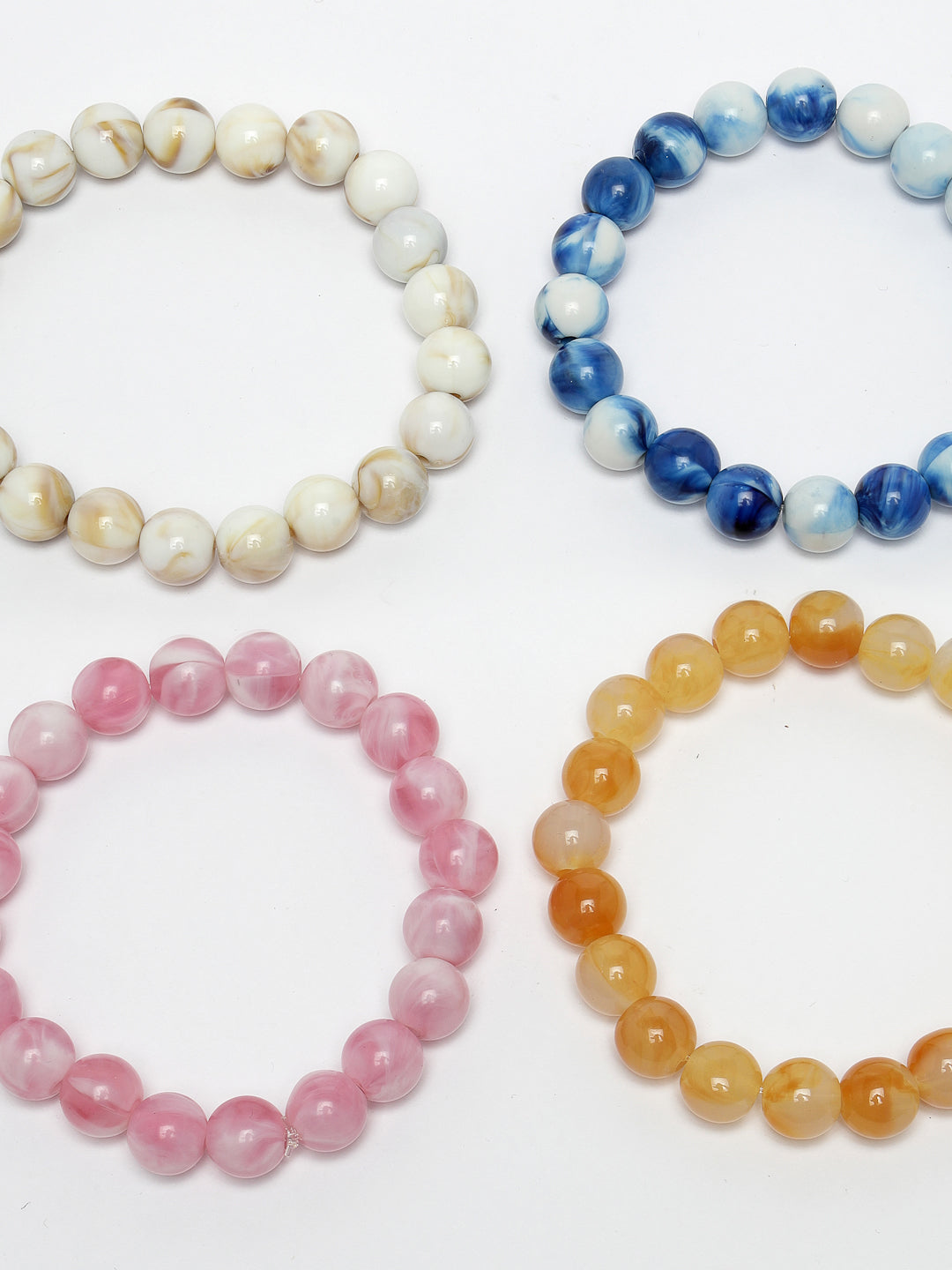 Set Of 4 Multicolor Elasticated Rakhi With Roli Chawal