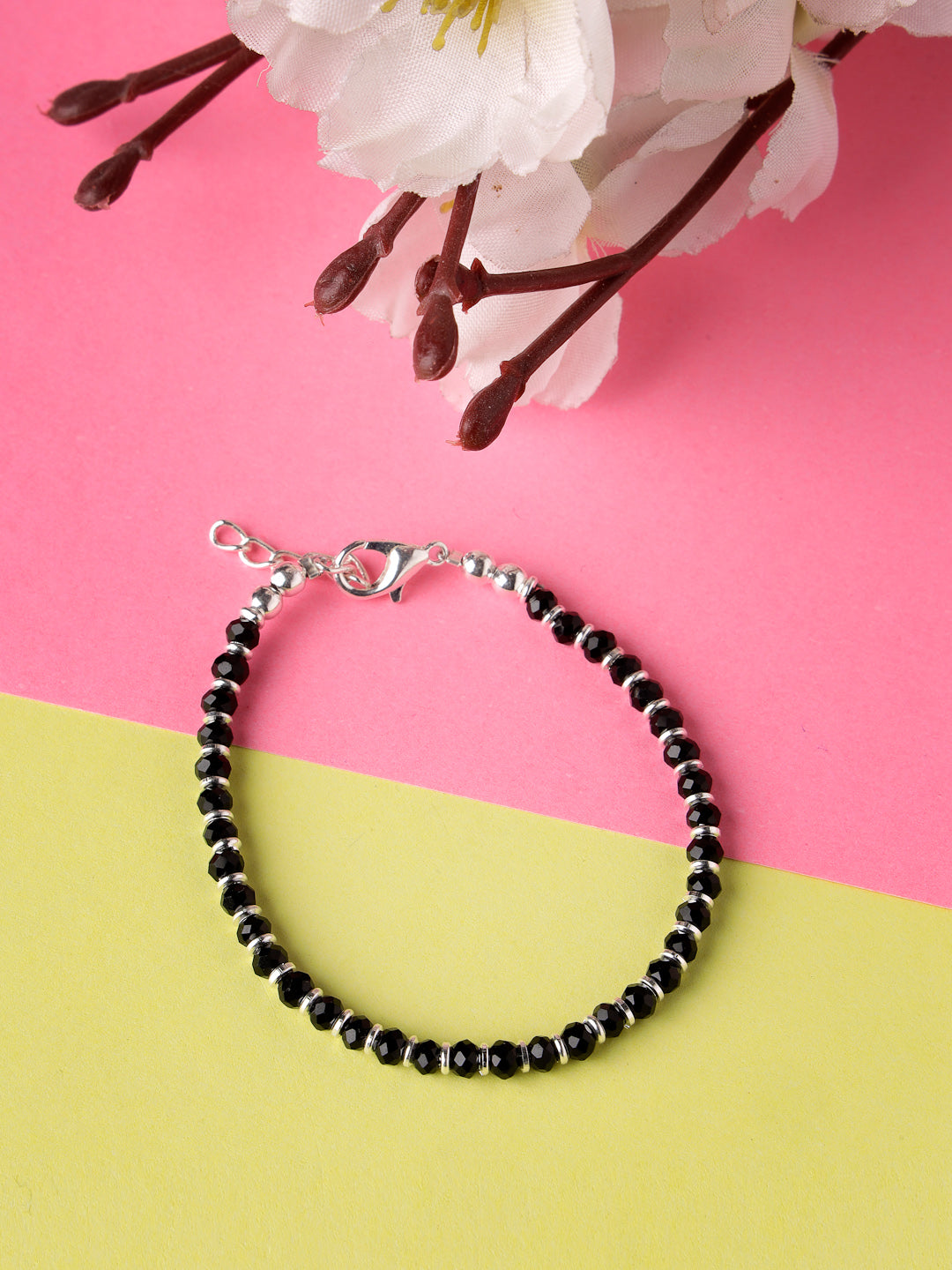 Silver Plated Black Beaded Adjustable Rakhi With Roli Chawal
