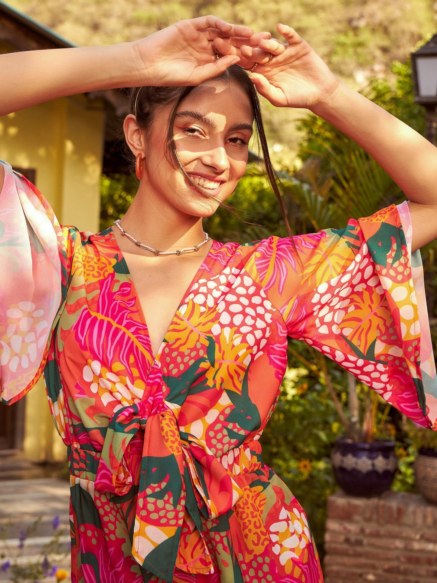 Women's Orange Floral Front Tie Knot Playsuit