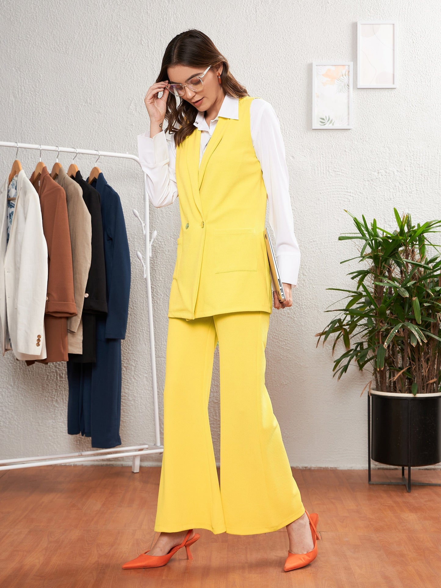 Women's Yellow Sleeveless Blazer With Bell Bottom Pants