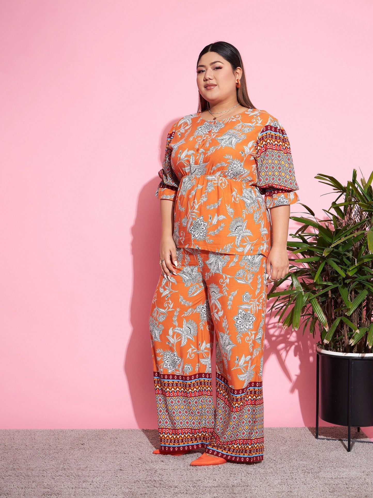 Women's Orange Floral Peplum Top With Straight Pants