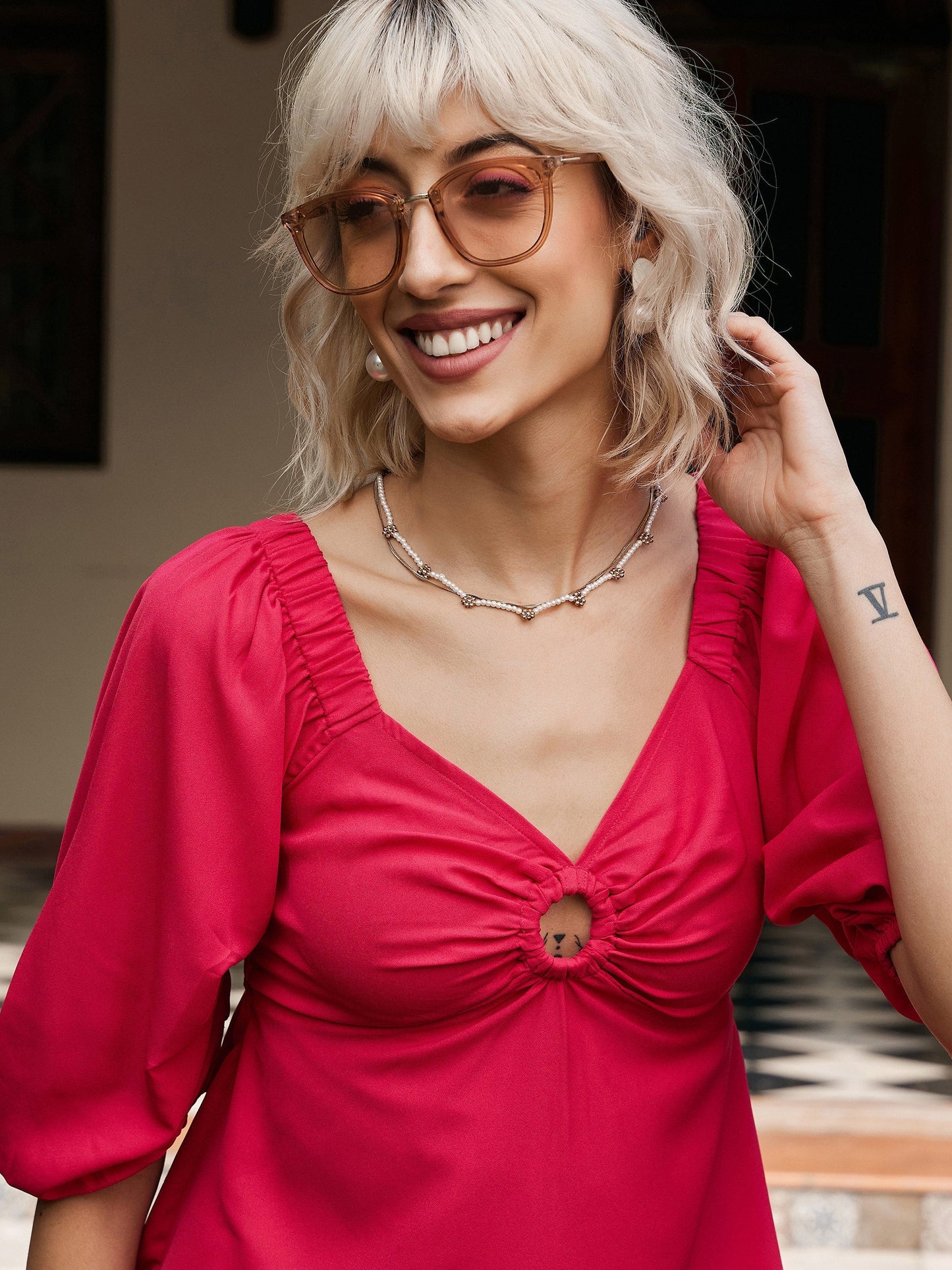 Women's Fuchsia Front Keyhole Peplum Top