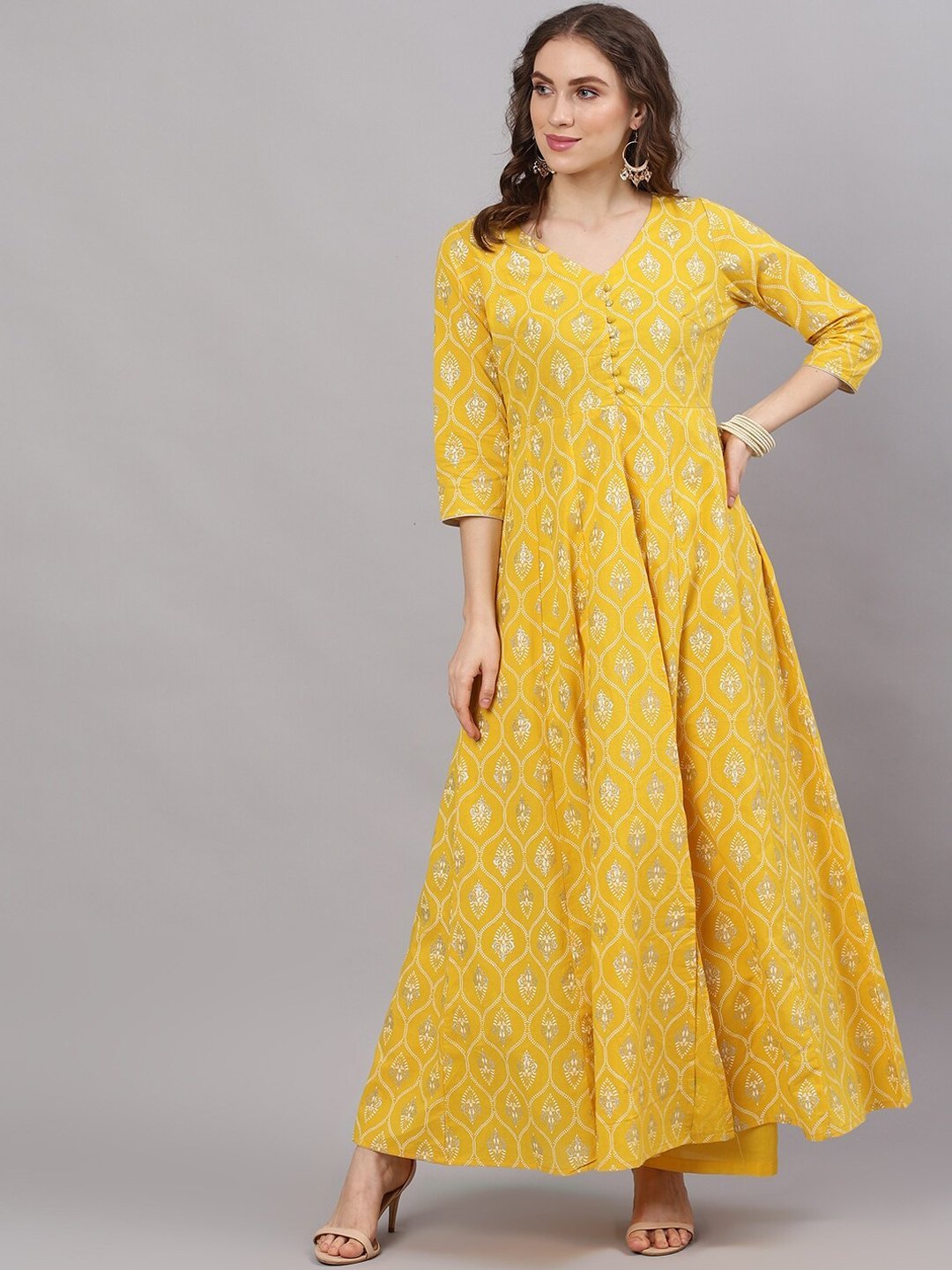 Women's  Yellow Self Design Kurta with Trousers