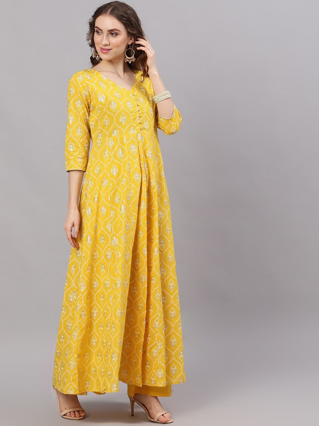 Women's  Yellow Self Design Kurta with Trousers