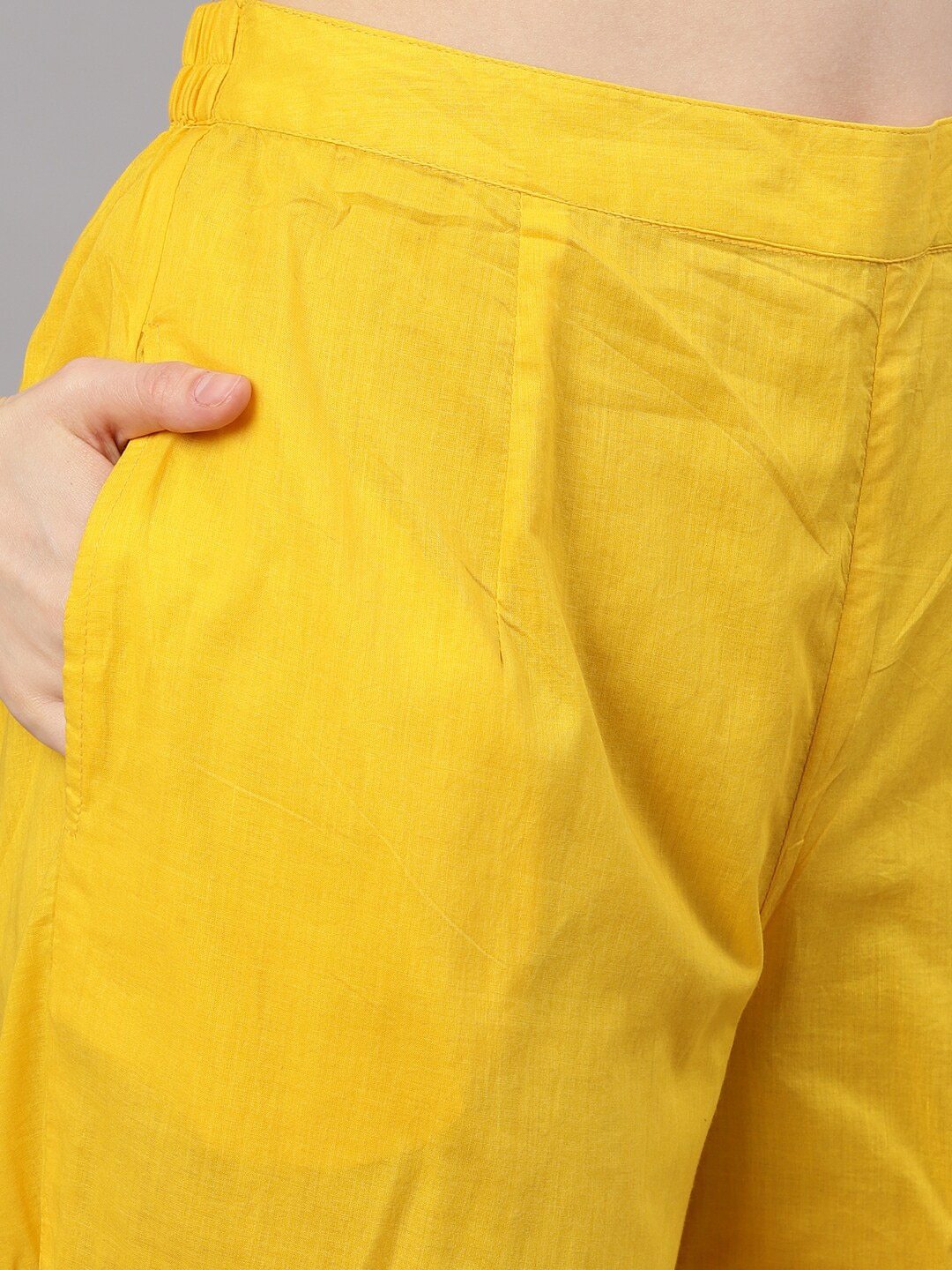 Women's  Yellow Self Design Kurta with Trousers