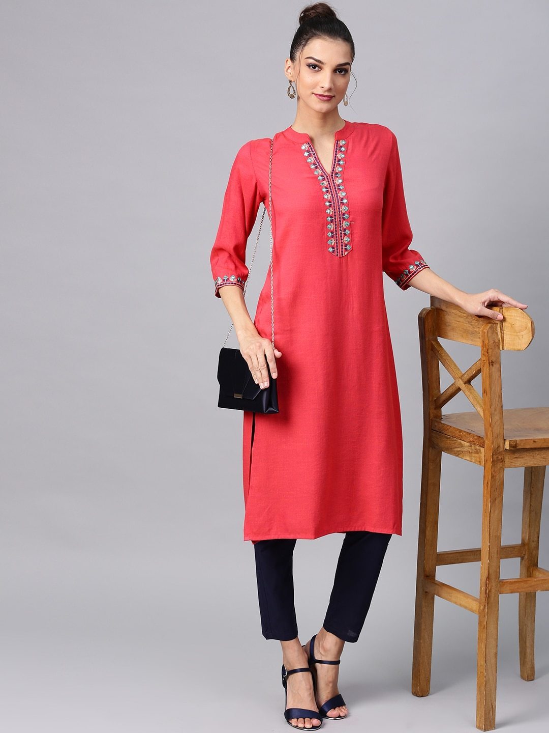 Women's  Coral Pink Solid Straight Kurta With Embroidered Detail